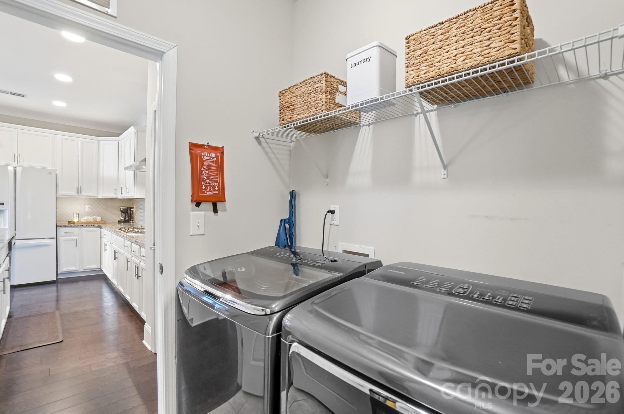 6270 Hove Road Mint Hill, NC 28227 - Photo 29 of 46 a kitchen with a sink cabinets and stainless steel appliances