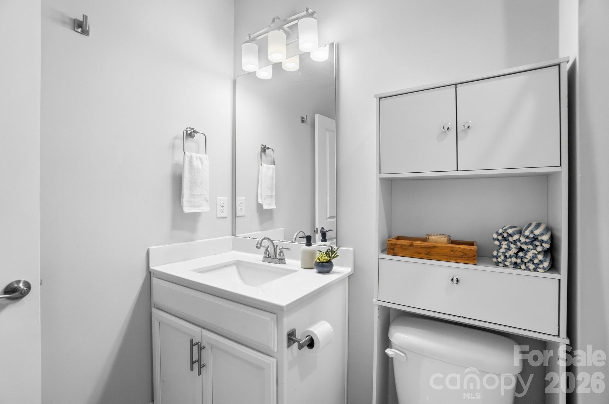 6270 Hove Road Mint Hill, NC 28227 - Photo 33 of 46 a bathroom with a sink and a mirror
