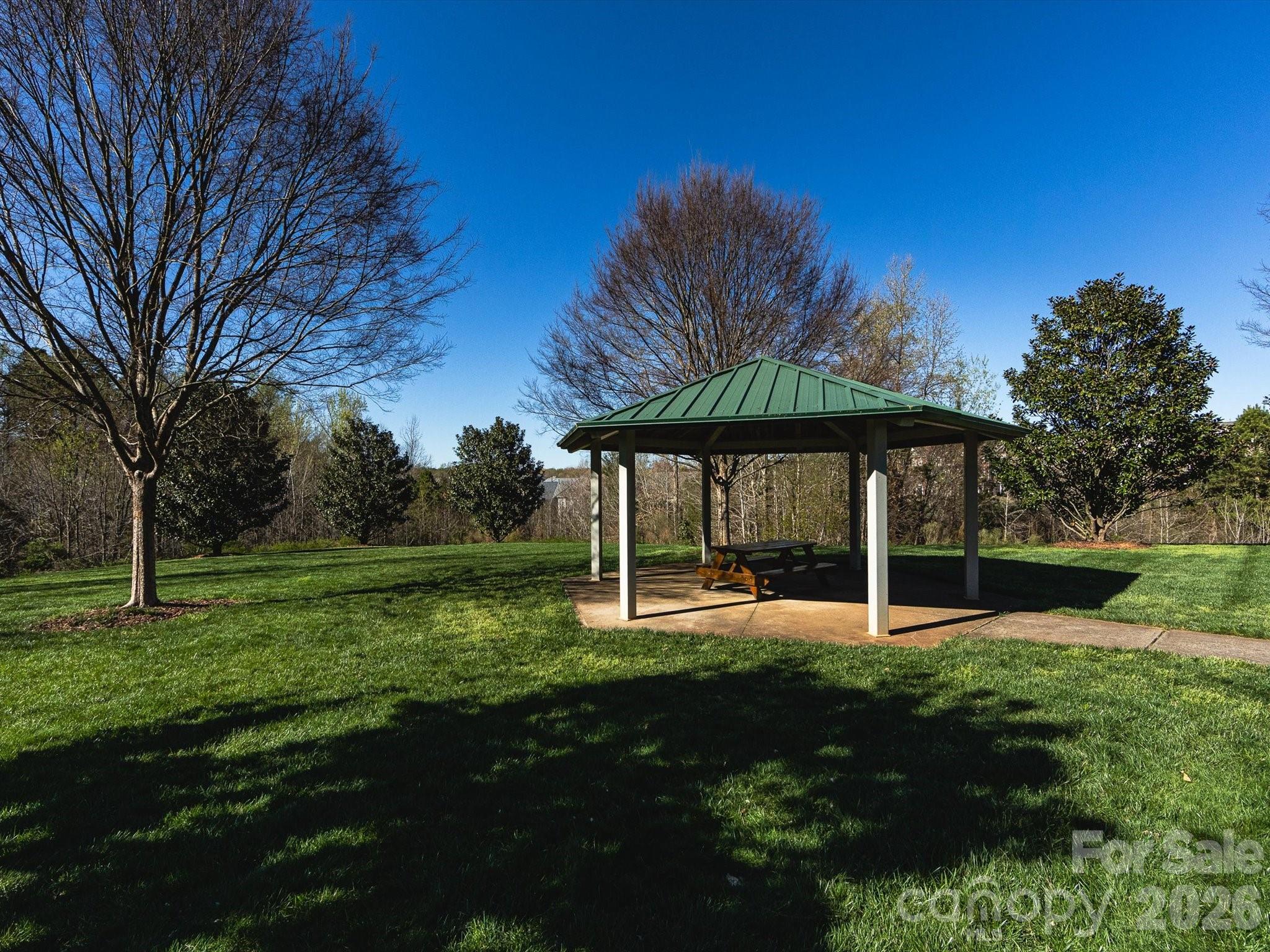 6270 Hove Road Mint Hill, NC 28227 - Photo 44 of 46 a backyard of a house with table and chairs
