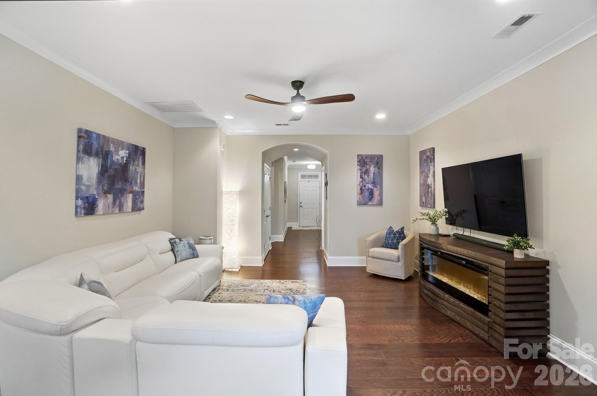 6270 Hove Road Mint Hill, NC 28227 - Photo 7 of 46 a living room with furniture and a flat screen tv