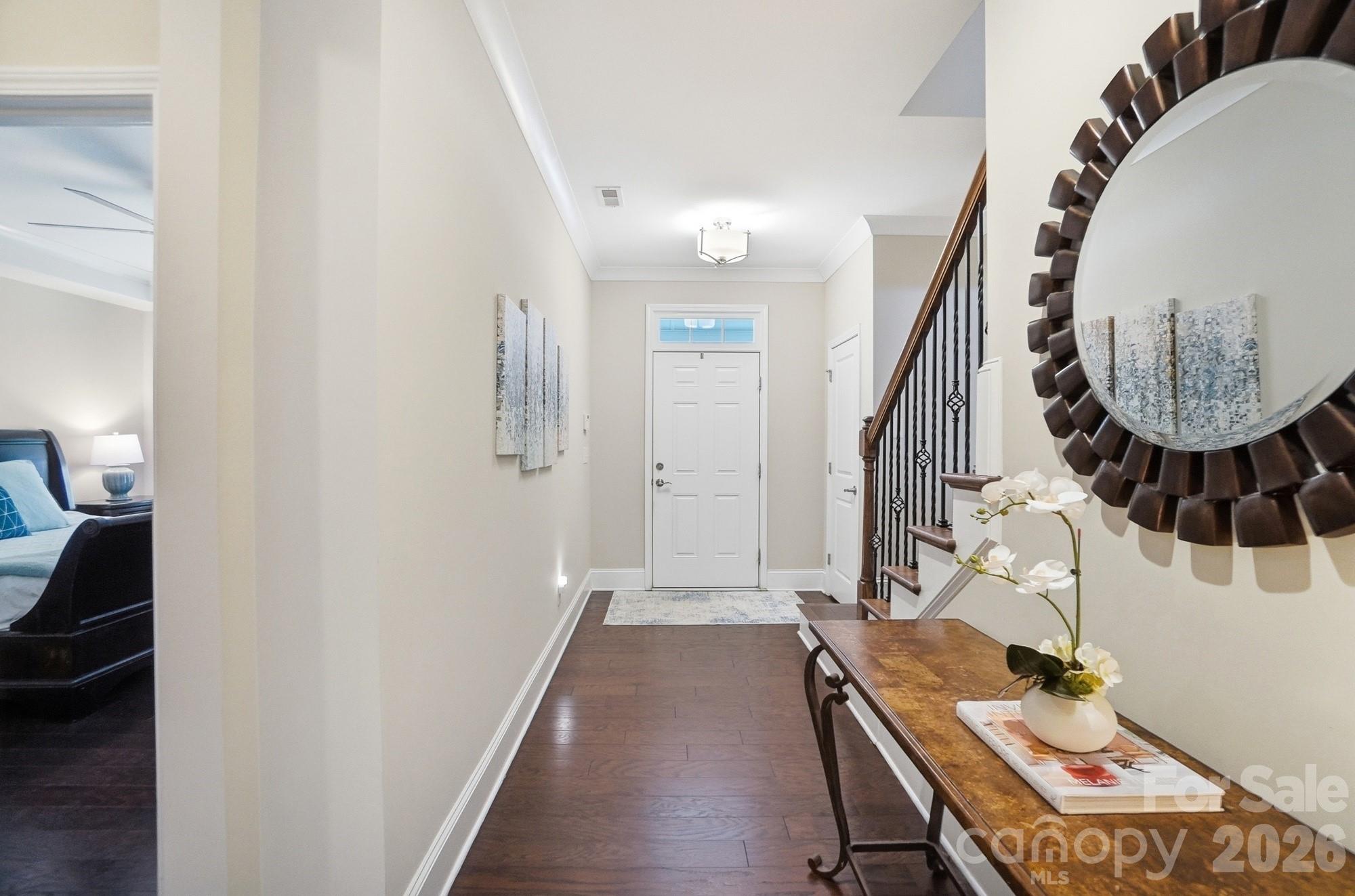 6270 Hove Road Mint Hill, NC 28227 - Photo 8 of 46 a view of a hallway with furniture and entryway