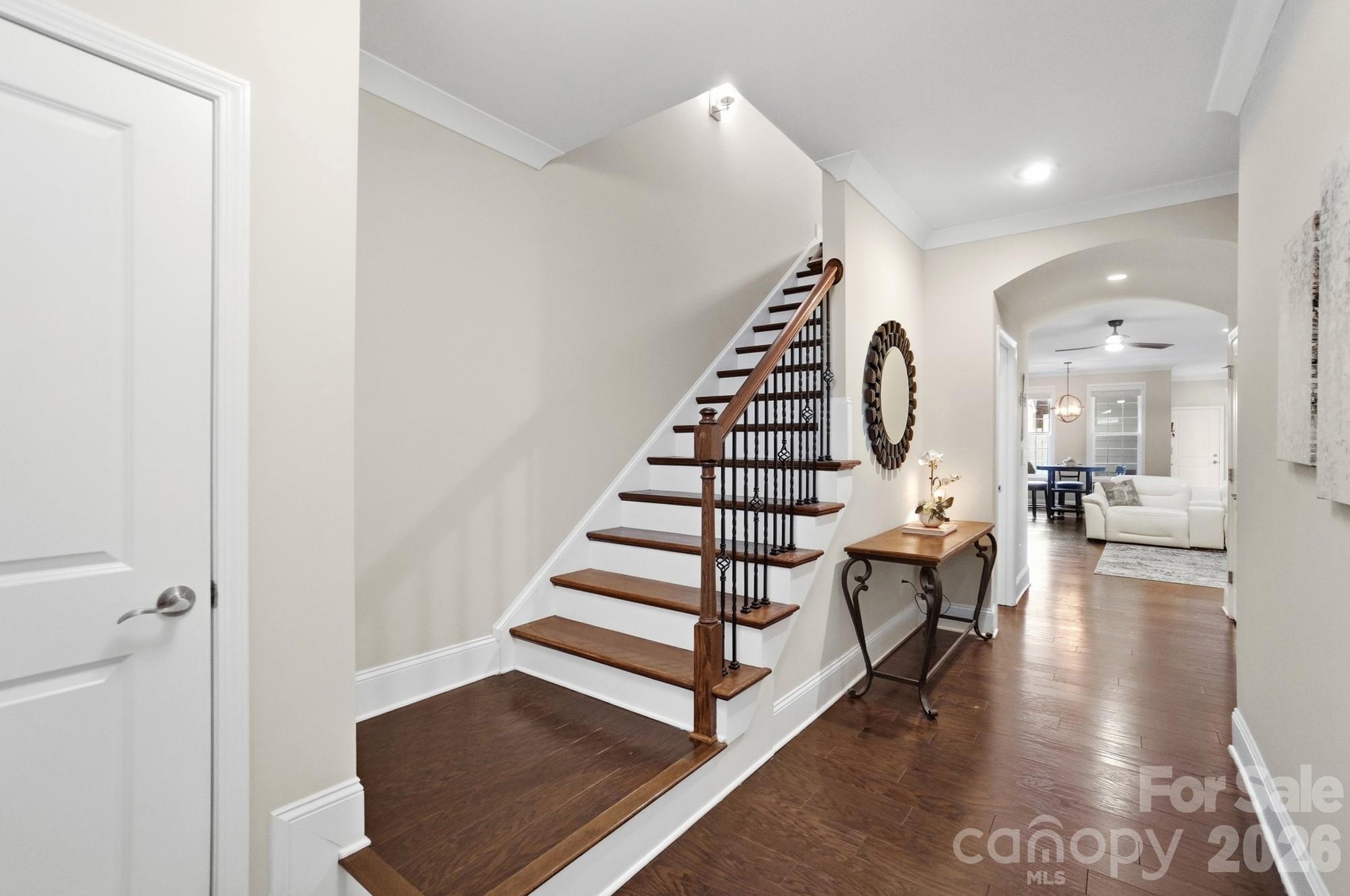 6270 Hove Road Mint Hill, NC 28227 - Photo 9 of 46 a view of entryway and hall with wooden floor