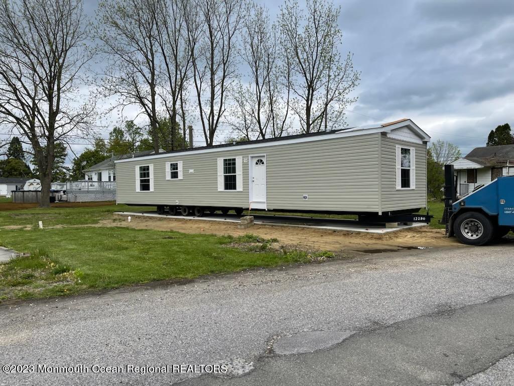 a house view with a backyard space