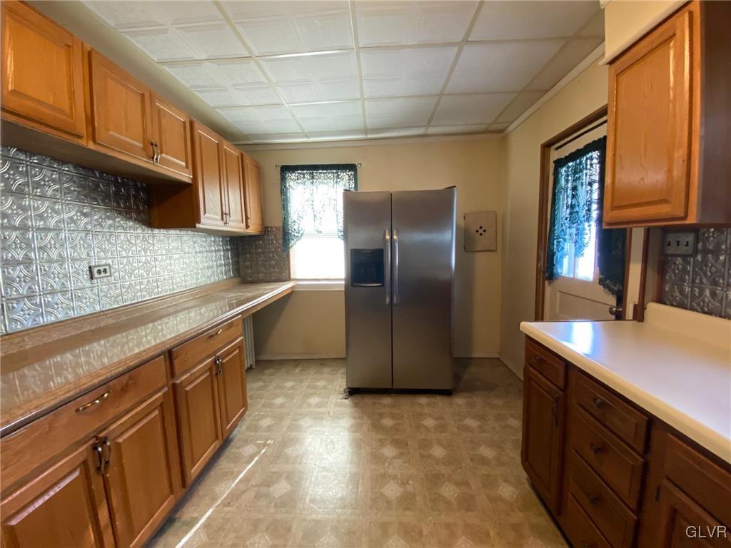 282 13th Avenue Bethlehem, PA 18018 - Photo 9 of 28 a kitchen with stainless steel appliances granite countertop a refrigerator a sink dishwasher stove and oven
