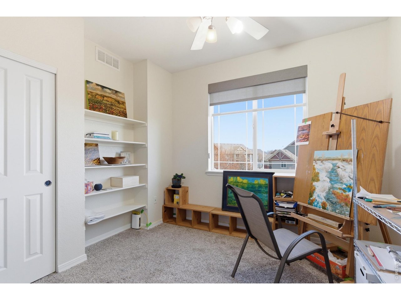 2133 Krisron Road, Unit E302 Fort Collins, CO 80525 - Photo 9 of 18 Guest bedroom with built in shelving and custom shades