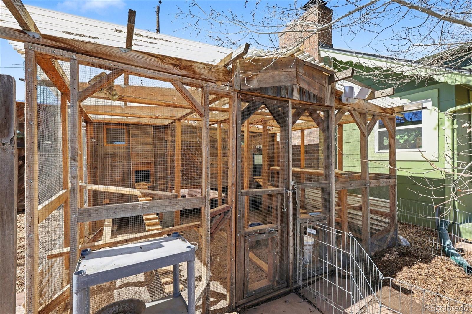 9795 Morrison Road Lakewood, CO 80227 - Photo 19 of 27 a front view of a building with glass windows