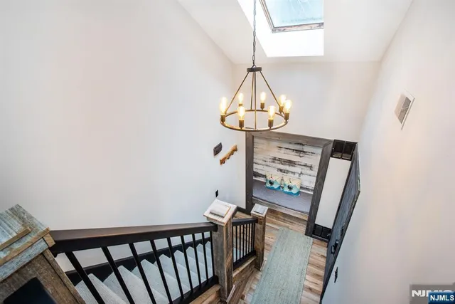 a bedroom with a bed and a chair