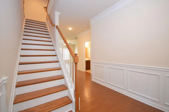 a view of a hallway with front door