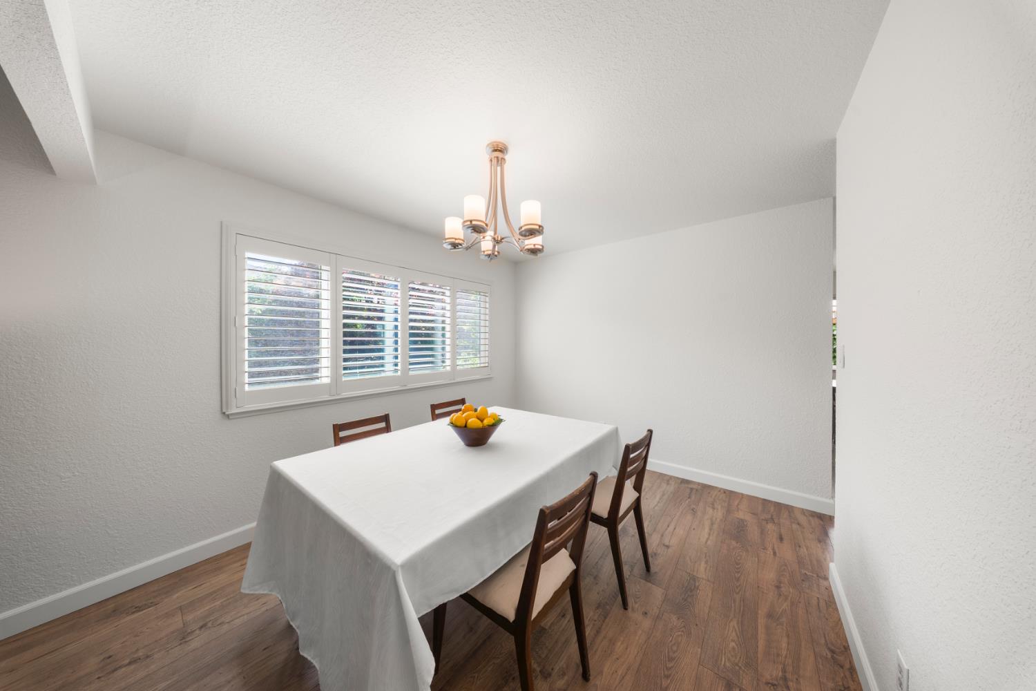 1325 Forest Drive Turlock, CA 95380 - Photo 18 of 28 a view of a dining room with furniture and window