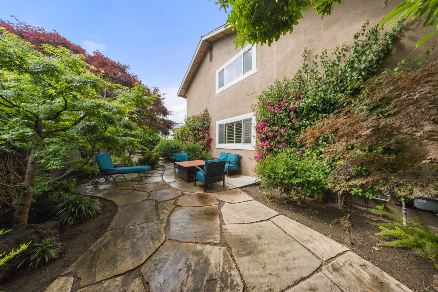 1325 Forest Drive Turlock, CA 95380 - Photo 25 of 28 a view of backyard with outdoor seating and plants
