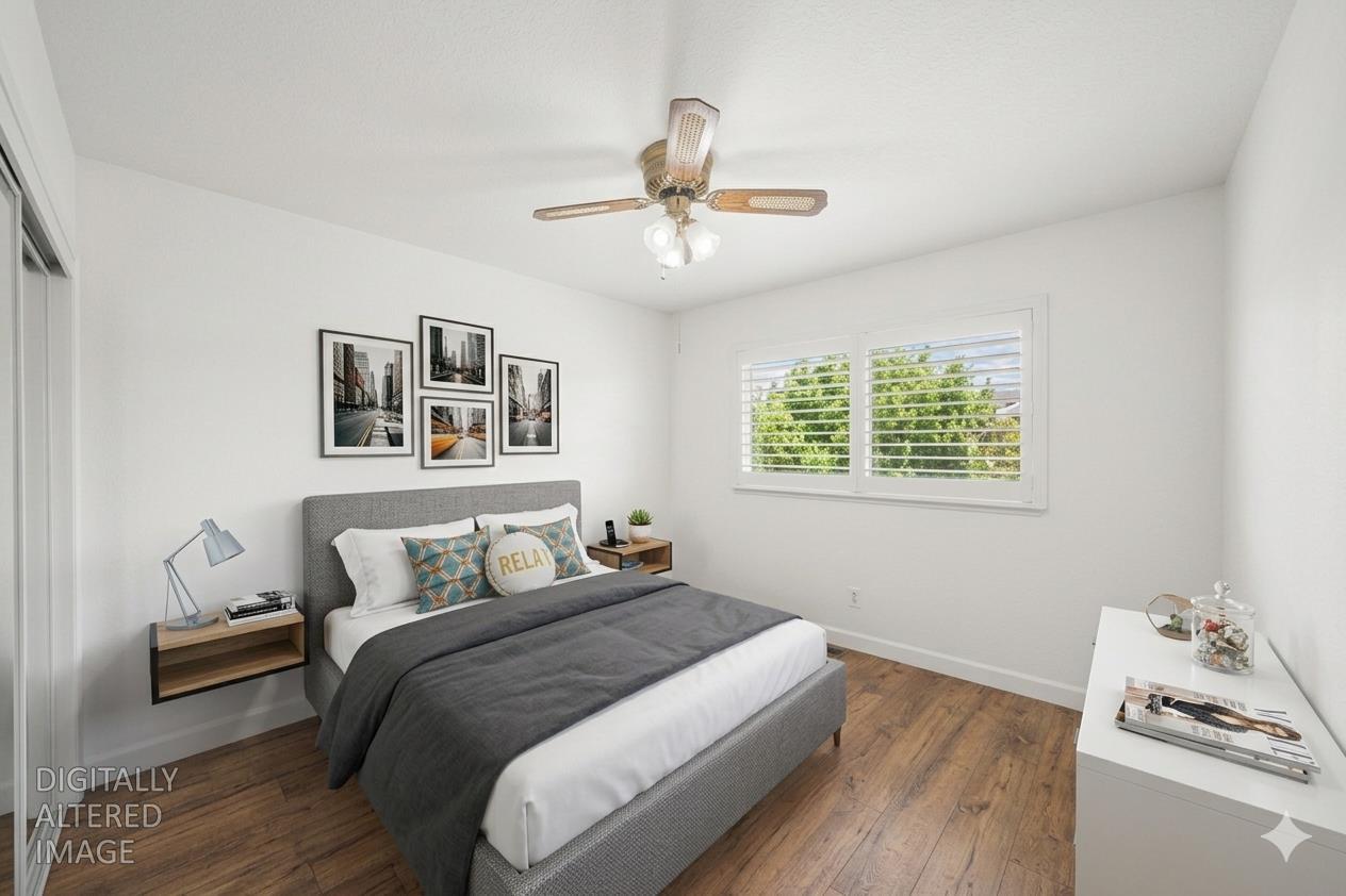 1325 Forest Drive Turlock, CA 95380 - Photo 6 of 28 a bedroom with a bed and a window