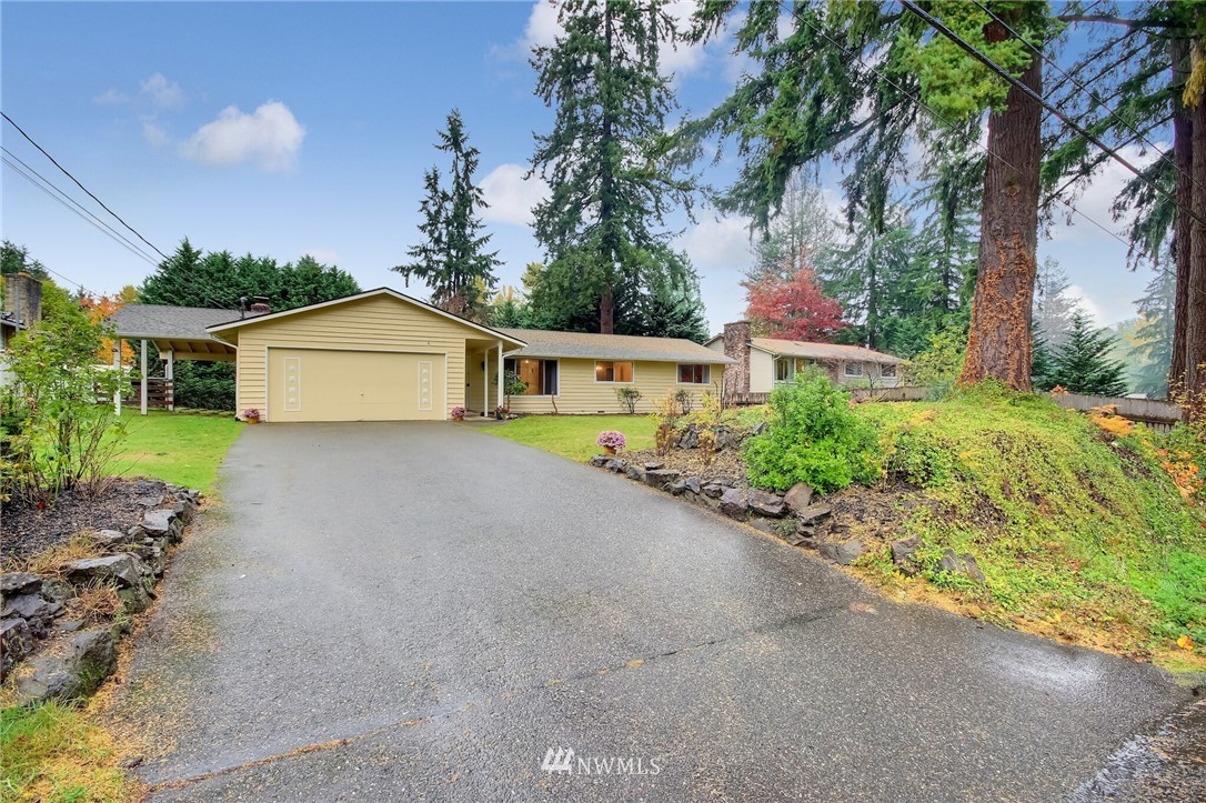4321 196th Street Southeast Bothell, WA 98012 - Photo 2 of 40 a view of a house with a street