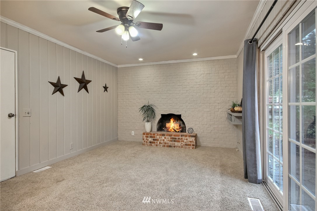 4321 196th Street Southeast Bothell, WA 98012 - Photo 22 of 40 a living room with closet