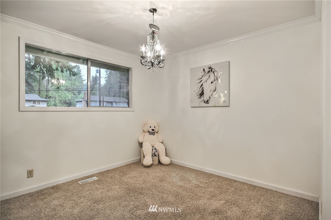4321 196th Street Southeast Bothell, WA 98012 - Photo 29 of 40 an empty room with a window