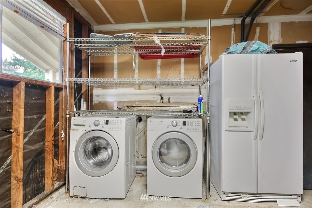 4321 196th Street Southeast Bothell, WA 98012 - Photo 34 of 40 a utility room with dryer and washer