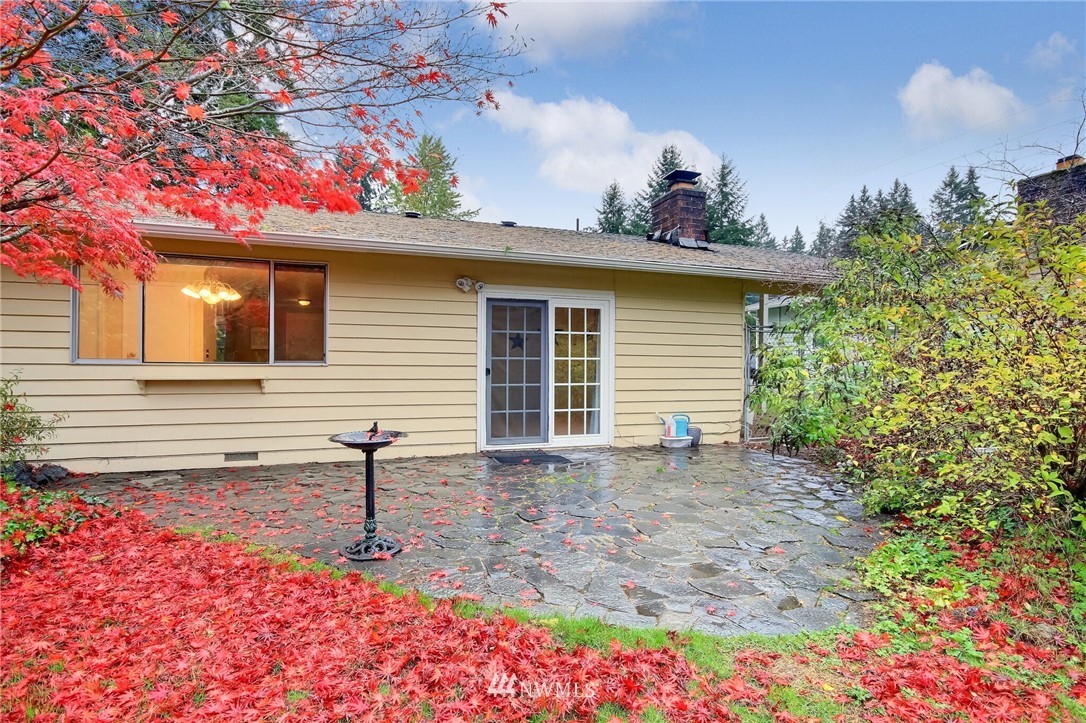 4321 196th Street Southeast Bothell, WA 98012 - Photo 36 of 40 a front view of a house with a yard