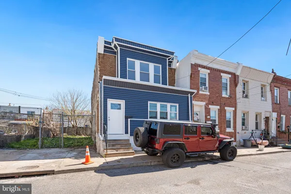 a car parked in front of a building