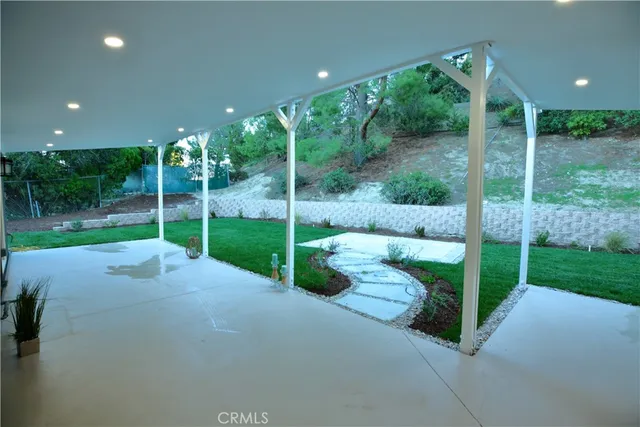 a view of backyard with green space