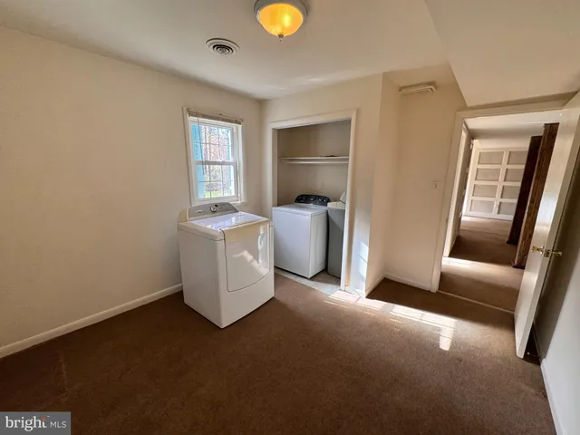 a workspace with furniture and window