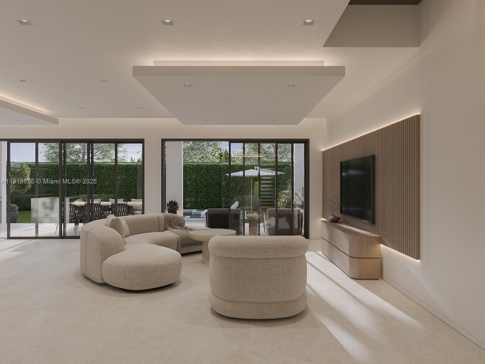 3170 Carter Street Miami, FL 33133 - Photo 11 of 12 a living room with furniture and a flat screen tv