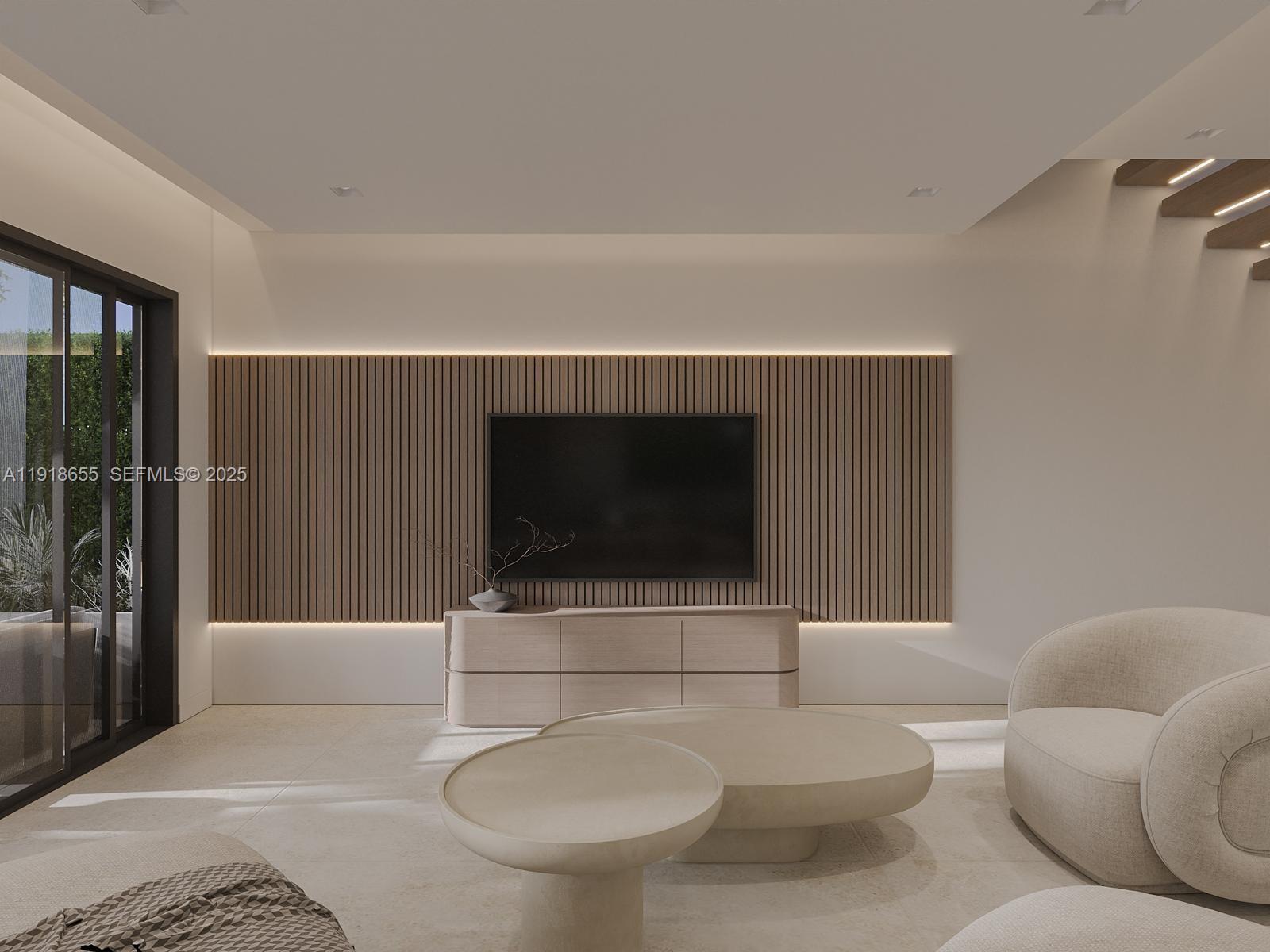 3170 Carter Street Miami, FL 33133 - Photo 4 of 12 a living room with furniture and a flat screen tv