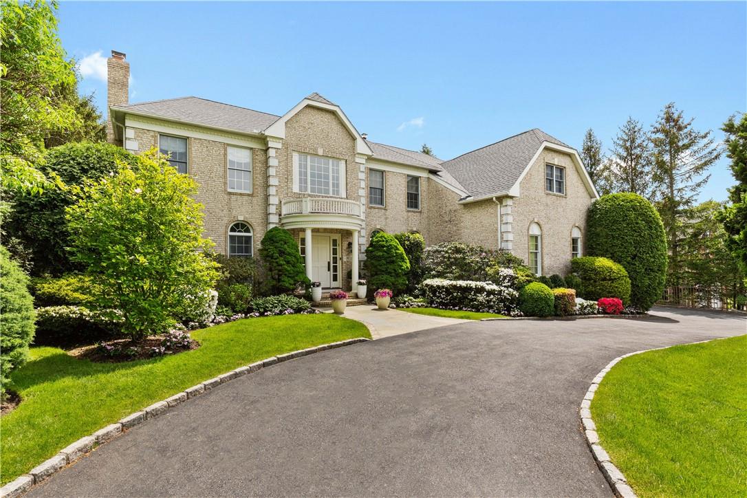 32 Paddock Road White Plains, NY 10605 - Photo 1 of 1 a front view of a house with a yard and porch