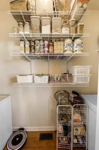 a close up of a kitchen with a stove and cabinets