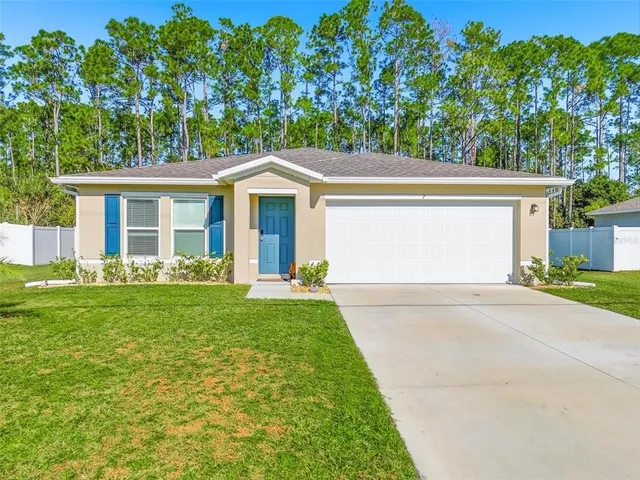front view of house with a yard