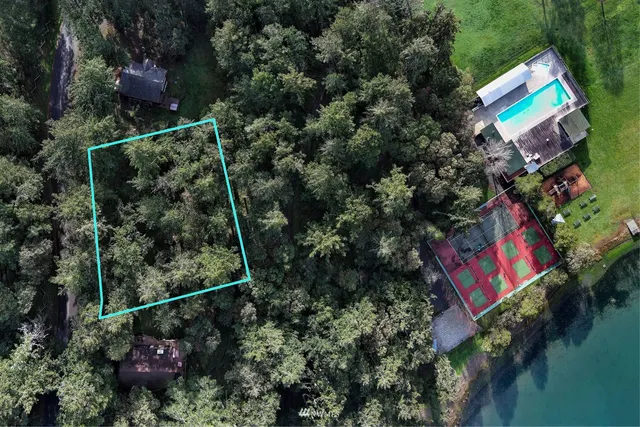 a view of a city with a lake