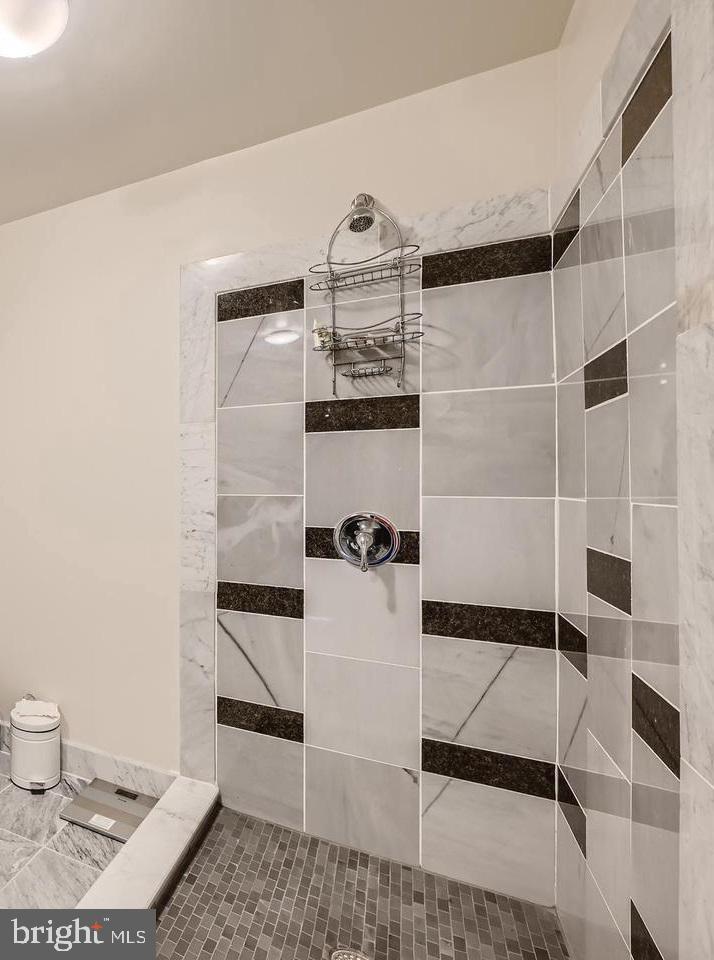 311 West Baltimore Street, Unit 104 Baltimore, MD 21201 - Photo 9 of 28 a kitchen with a sink and a refrigerator
