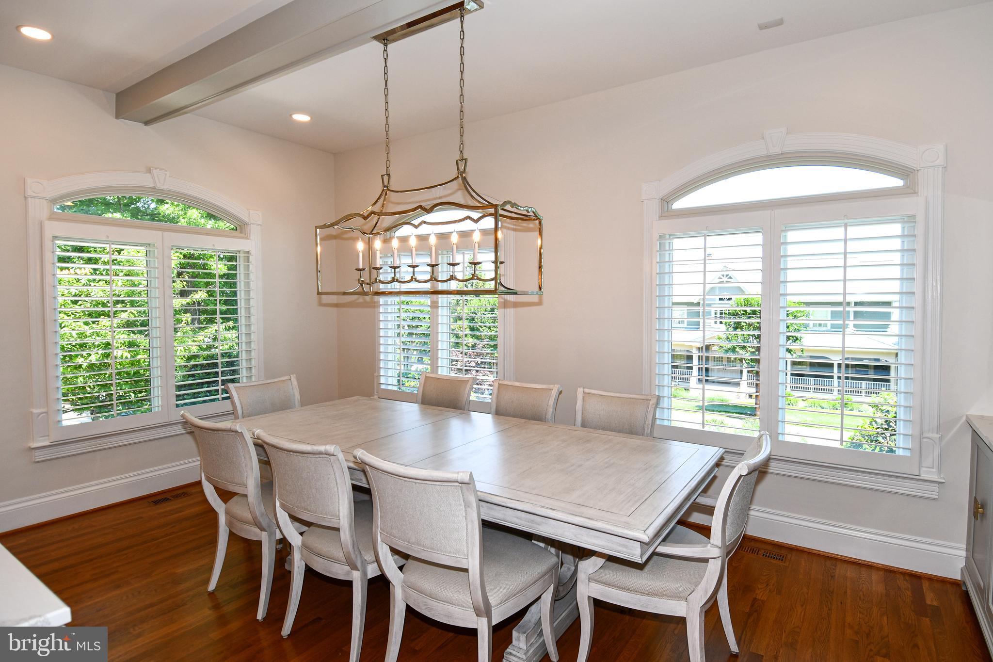 7808 Southdown Road Alexandria, VA 22308 - Photo 37 of 99 a view of a dining room with furniture window and outside view