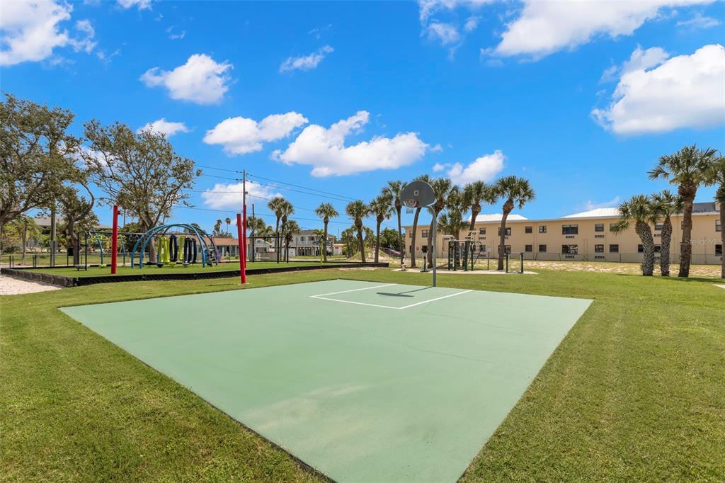 16333 Gulf Boulevard, Unit 113 Redington Beach, FL 33708 - Photo 30 of 40 a view of a playground with basketball court