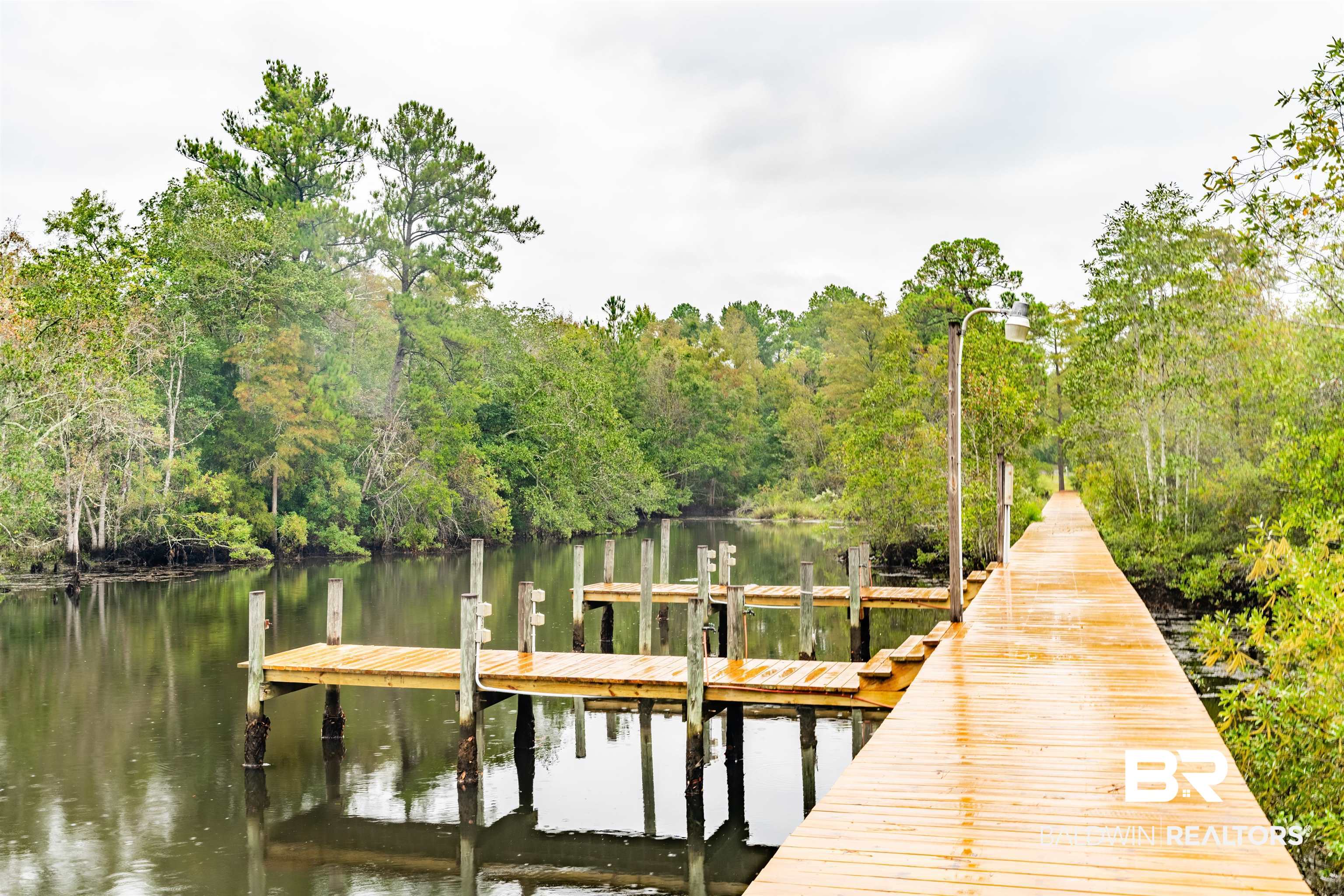4055 Riviere Du Chien Road Mobile, AL 36693 - Photo 52 of 63 View of dock with a water view