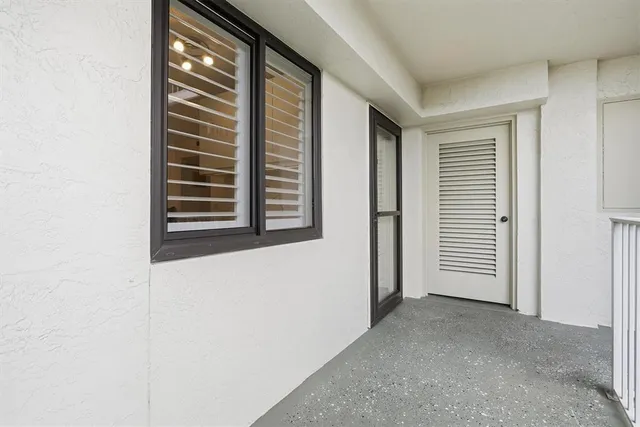 a view of a room that has a window in it