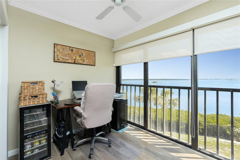 1591 Beach Road, Unit 403 Englewood, FL 34223 - Photo 15 of 61 a view of a workspace with furniture and a window