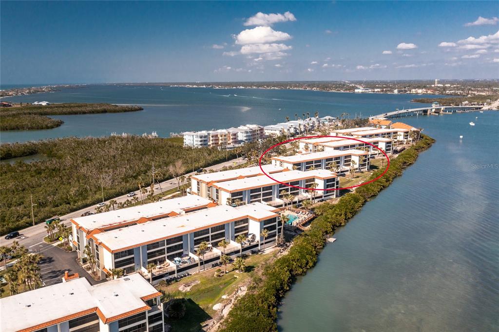 1591 Beach Road, Unit 403 Englewood, FL 34223 - Photo 51 of 61 a view of a lake with a city