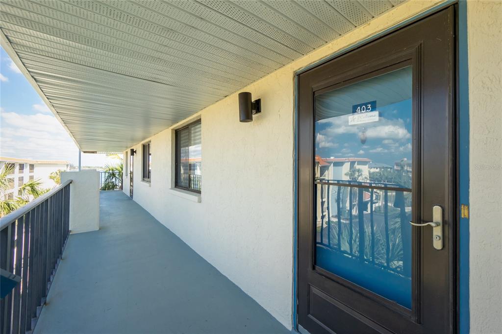 1591 Beach Road, Unit 403 Englewood, FL 34223 - Photo 7 of 61 a view of a porch