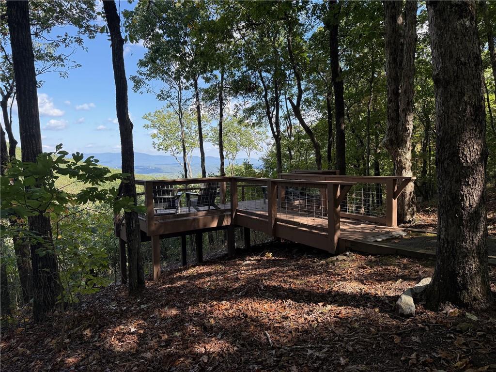 28 Sharp Mountain Drive Jasper, GA 30143 - Photo 11 of 14 a view of a bench in a backyard