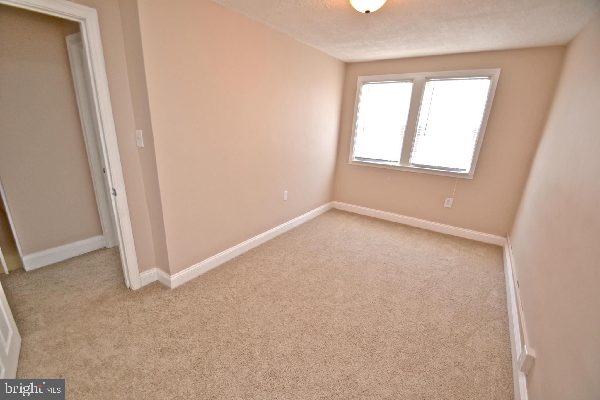 236 West Edgevale Road Baltimore, MD 21225 - Photo 14 of 30 an empty room with windows