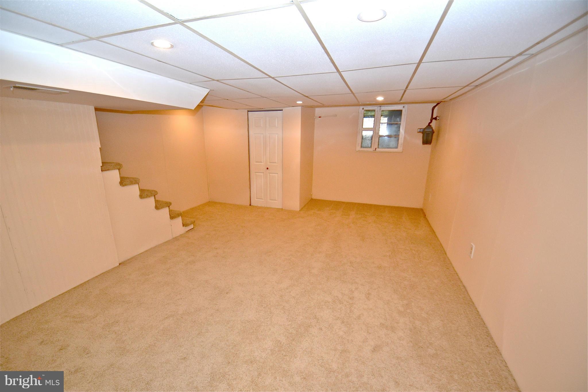 236 West Edgevale Road Baltimore, MD 21225 - Photo 22 of 30 a view of hallway with a window