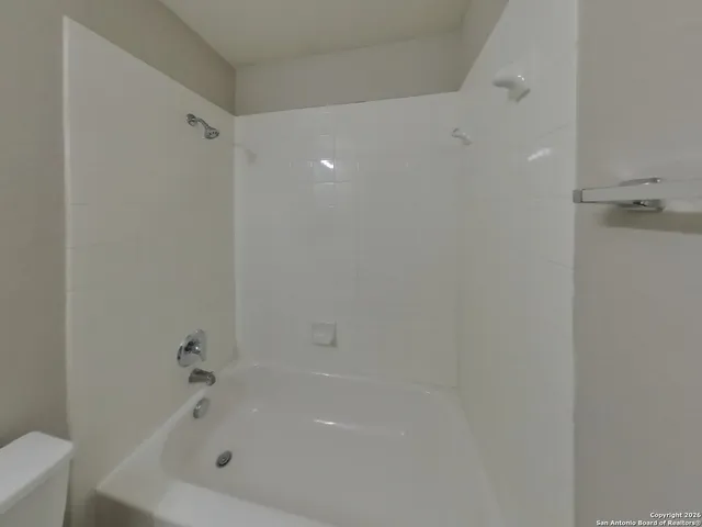 a bathroom with a tub