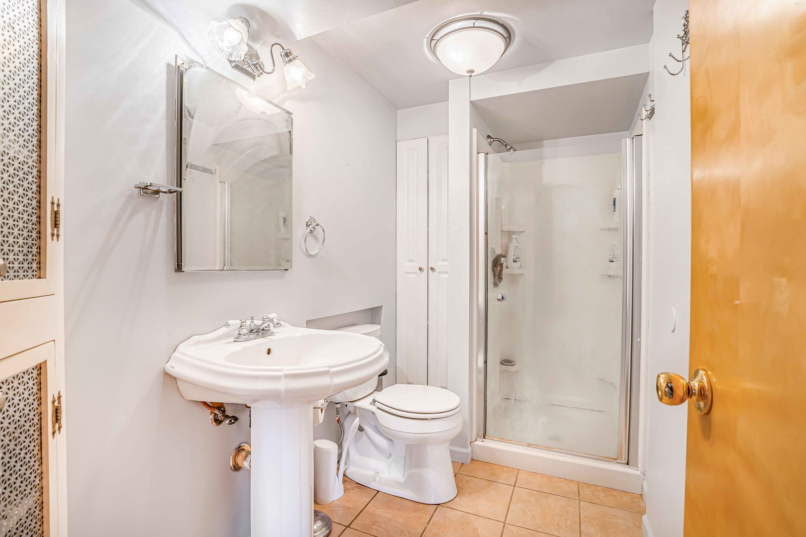 3542 191st Place Lansing, IL 60438 - Photo 11 of 18 a bathroom with a sink toilet and shower