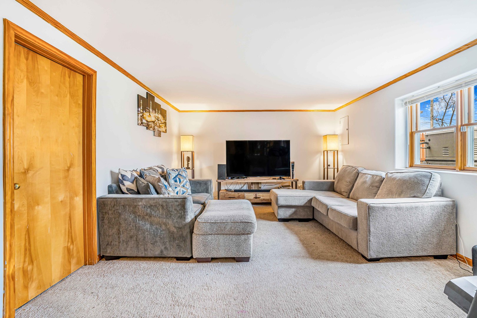 3542 191st Place Lansing, IL 60438 - Photo 13 of 18 a living room with furniture and a flat screen tv