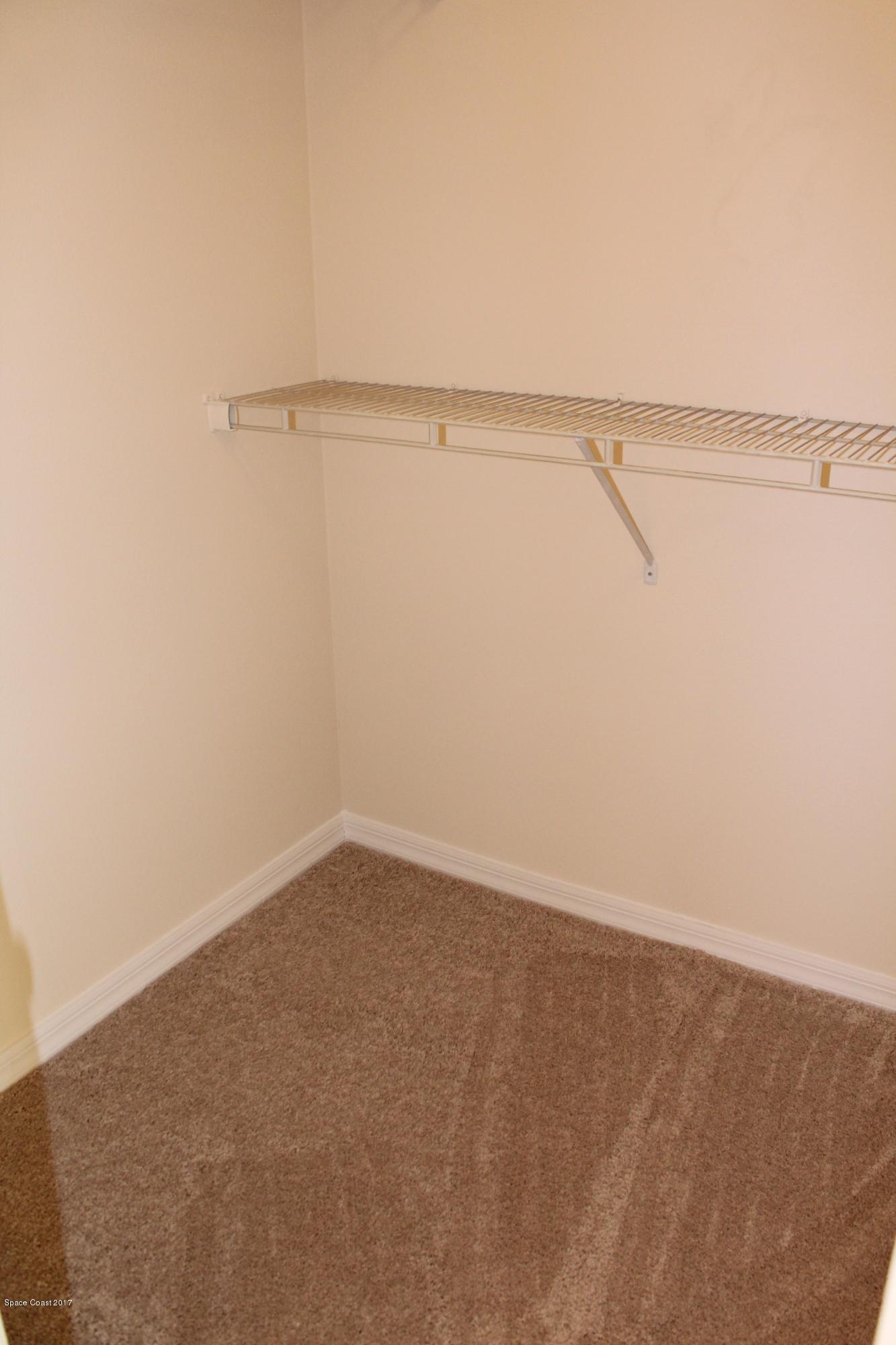 5220 Carrick Road Cocoa, FL 32927 - Photo 22 of 33 Large walk-in closet for him