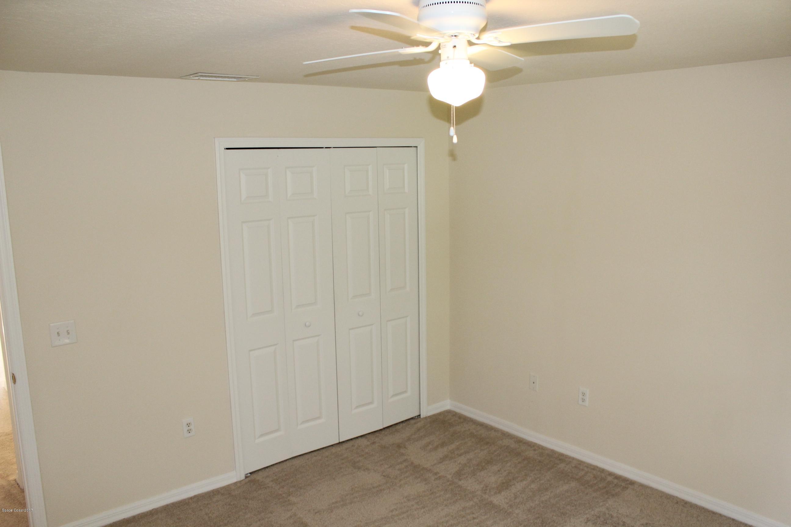 5220 Carrick Road Cocoa, FL 32927 - Photo 26 of 33 2nd bedroom closet view