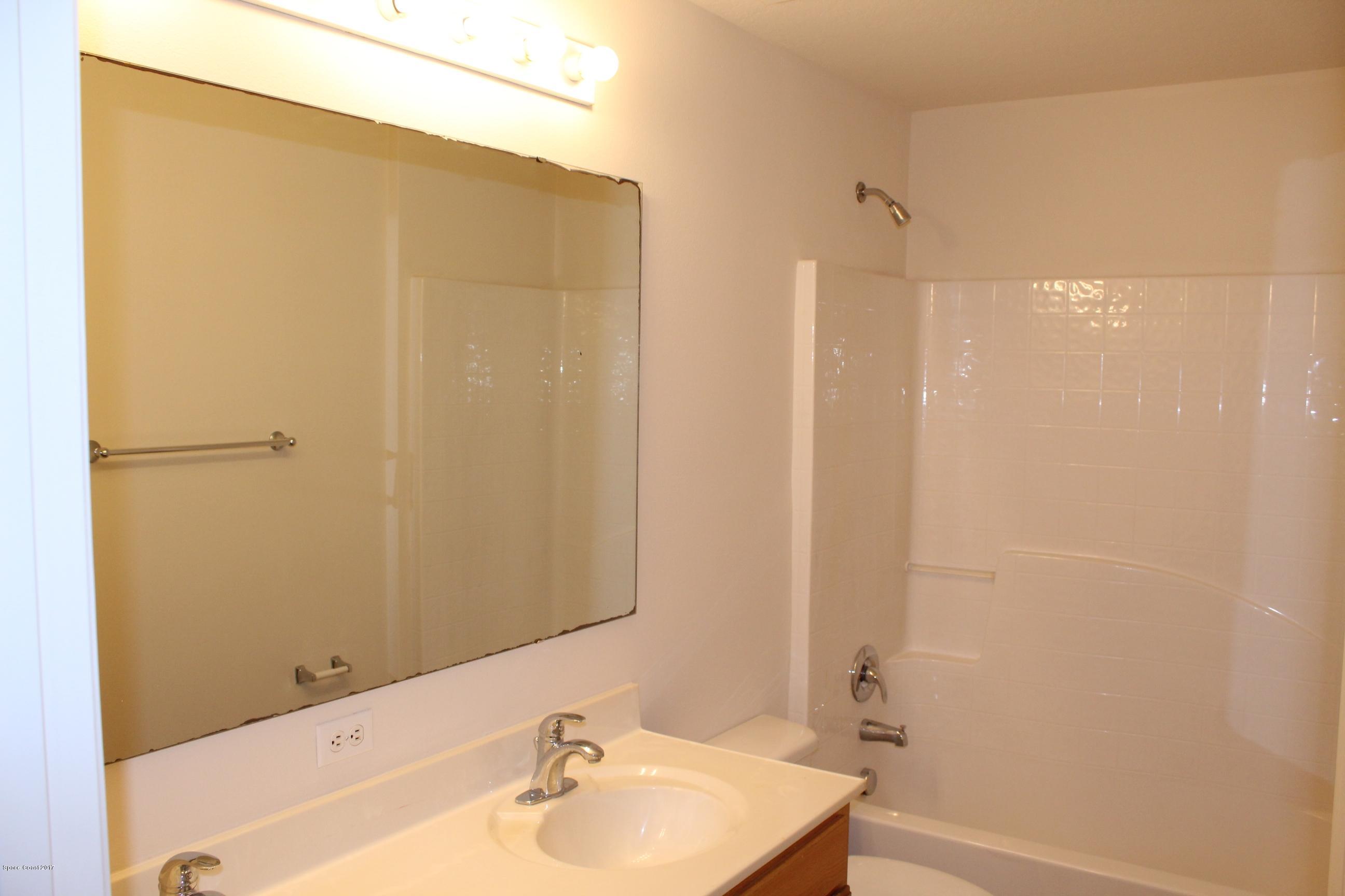 5220 Carrick Road Cocoa, FL 32927 - Photo 27 of 33 2nd floor guest bathroom w/double sinks
