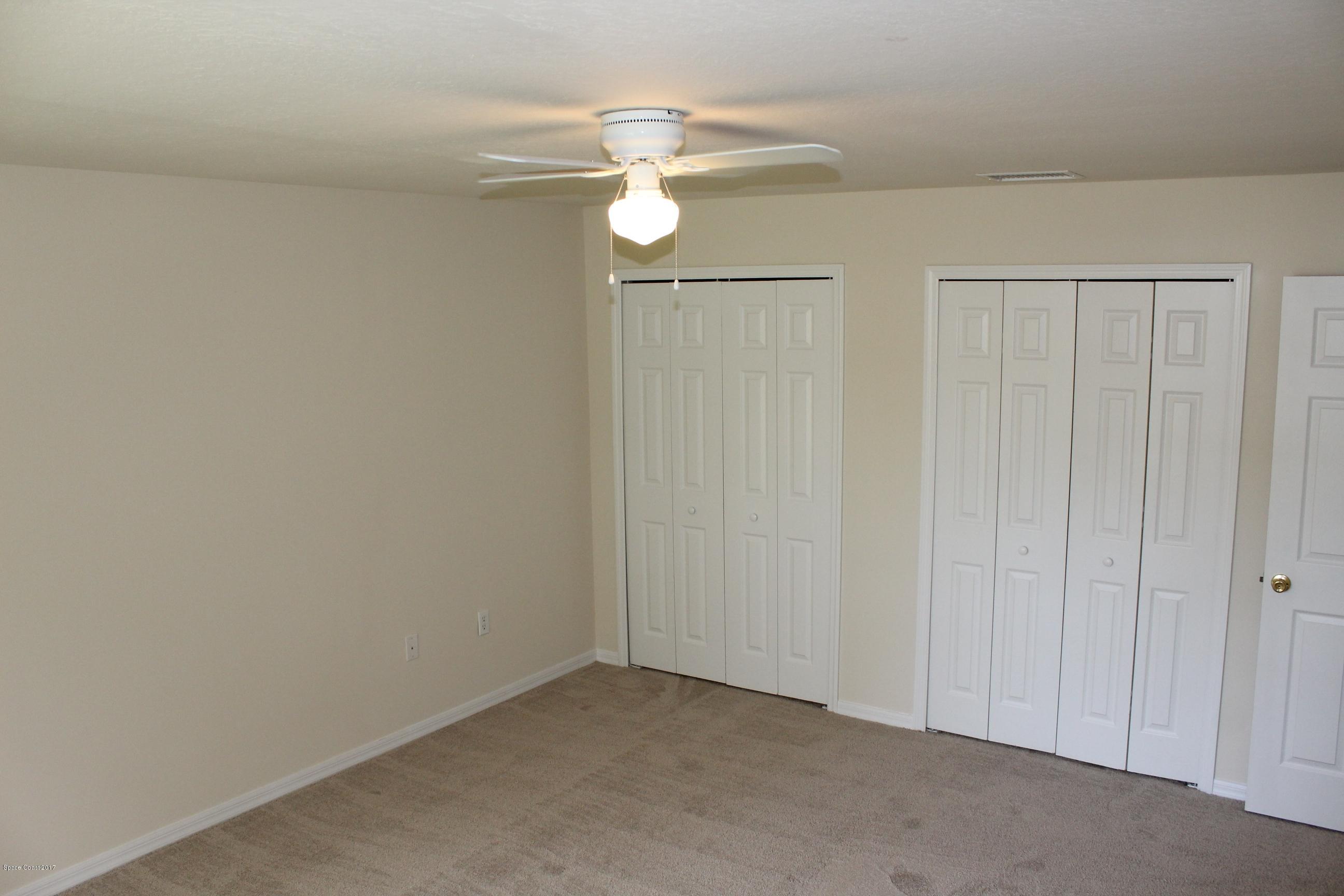 5220 Carrick Road Cocoa, FL 32927 - Photo 31 of 33 4th bedroom closet view