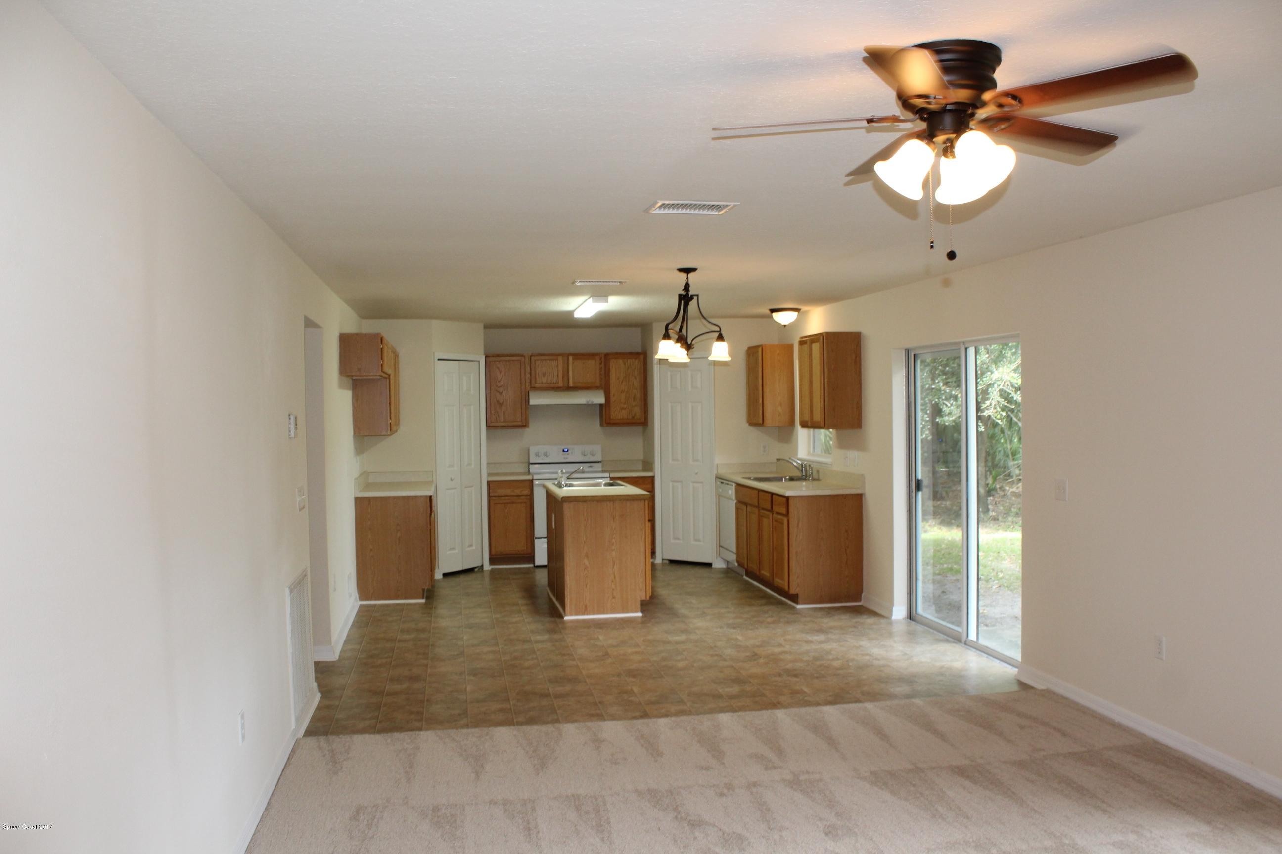 5220 Carrick Road Cocoa, FL 32927 - Photo 10 of 33 Family & kitchen view