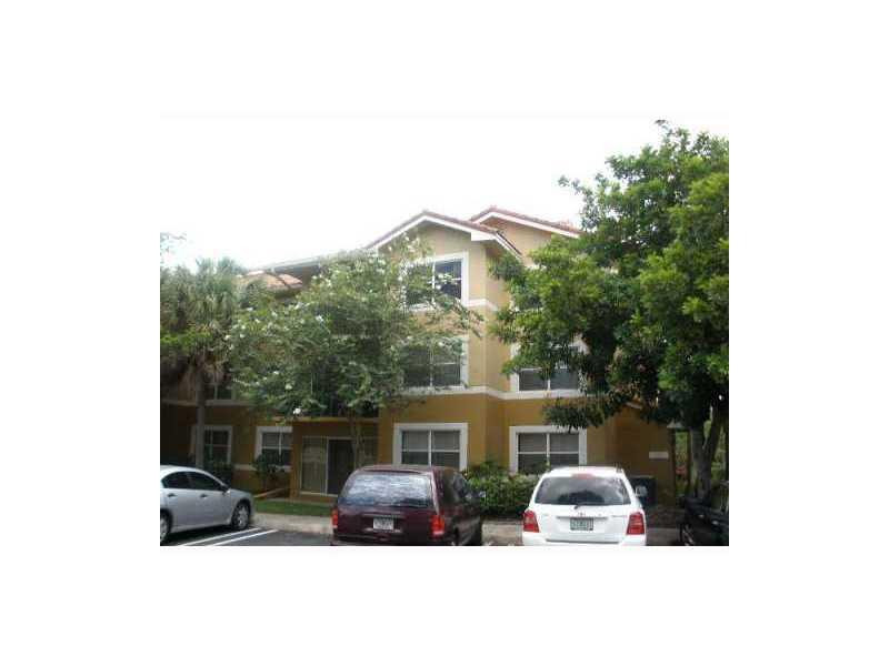8701 Wiles Road, Unit 106 Coral Springs, FL 33067 - Photo 1 of 3 Exterior Front