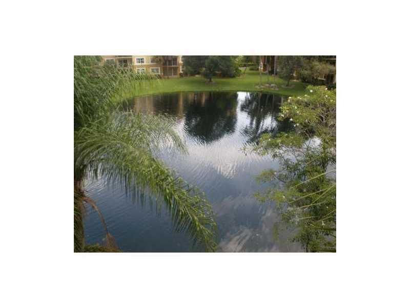 8701 Wiles Road, Unit 106 Coral Springs, FL 33067 - Photo 3 of 3 Exterior Front